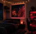 Red nebula galaxy wall art print above bed in RGB gaming bedroom with LED lighting